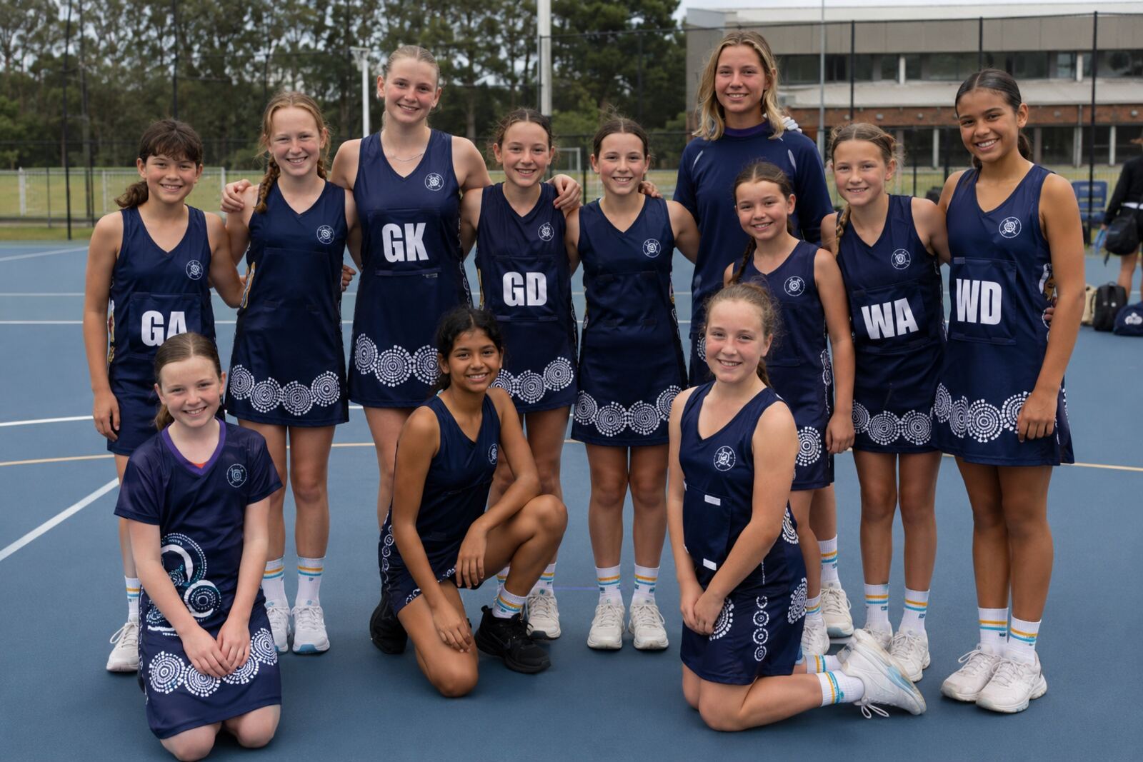 Junior netball team wearing custom socks